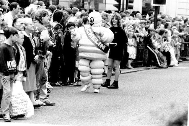The Michelin Man collecting for charity on The Headrow.