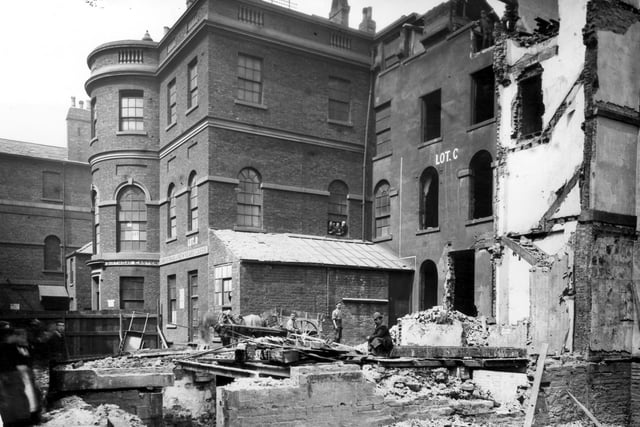This photo shows the demolition of the Old Infirmary, which was located on Infirmary Street. It was replaced by the present Leeds General Infirmary on Great George Street.