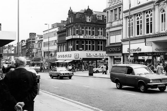 Briggate looking in the direction of the River Aire. Dolcis shoe shop in the centre is at the junction with Albion Place.