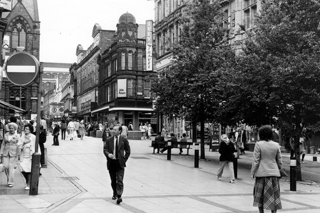 Lands Lane looking towards The Headrow, showing the pedestrian precinct which opened in 1972. Left and right the junctions with Albion Place are visible.