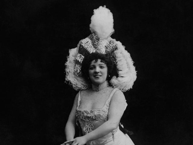 Her catchy songs about the often harsh realities of life at that time rang true with
audiences and won her the title, The Queen of the Halls'
