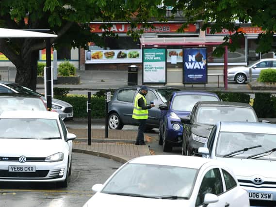 Drivers in Leeds queuing as the McDonald's drive-thru reopens.