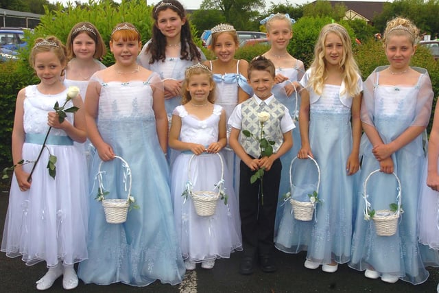 Rose Queen Megan Evans (with tiara in the middle) and her retinue