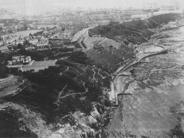The splendid hotel is on the left of this photo.