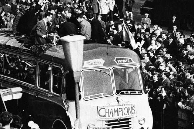 Leeds United parade the trophy through the streets of the city centre.