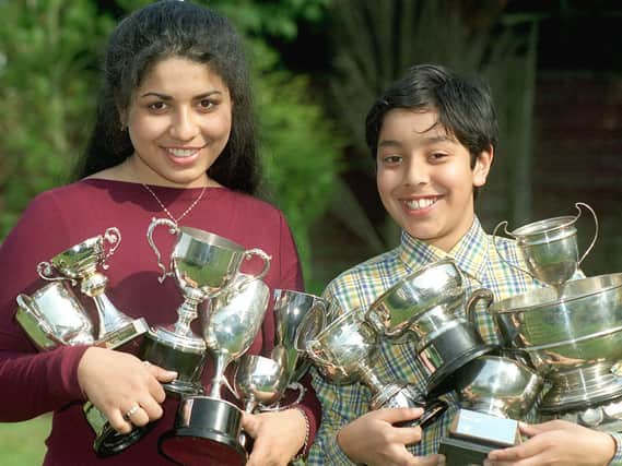 Aparna (16) and Karthik Ravi (12), of The Oaks, Poulton, who have just scooped thirteen trophies at the Lytham St Annes Music Festival in 1999