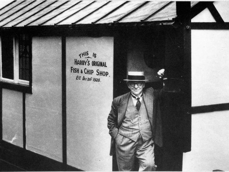 Harry Ramsden at the door of his first fish and chip shop in 1928. Three years later he moved into new premises at Guiseley, complete with fitted carpets, oak panelled walls, and chandeliers.