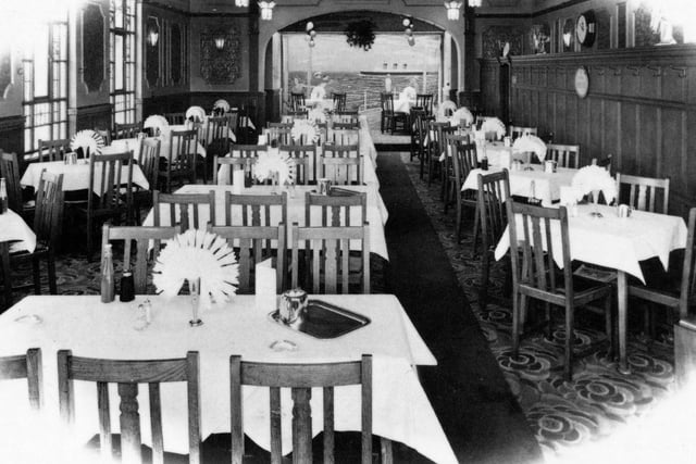 The Harry Ramsden's dining room, with wood panelling and Art Deco features.