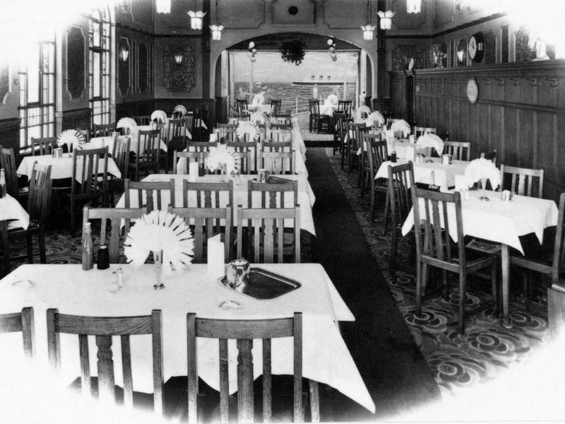 The Harry Ramsden's dining room, with wood panelling and Art Deco features.
