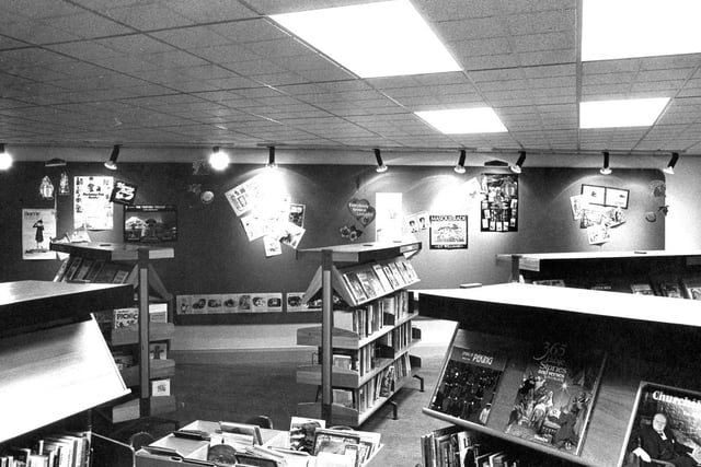 Inside Headingley Library in the year it was opened. This photo shows the childrens library area with shelving, kinder-boxes, noticeboard on wall to display posters and book jackets.