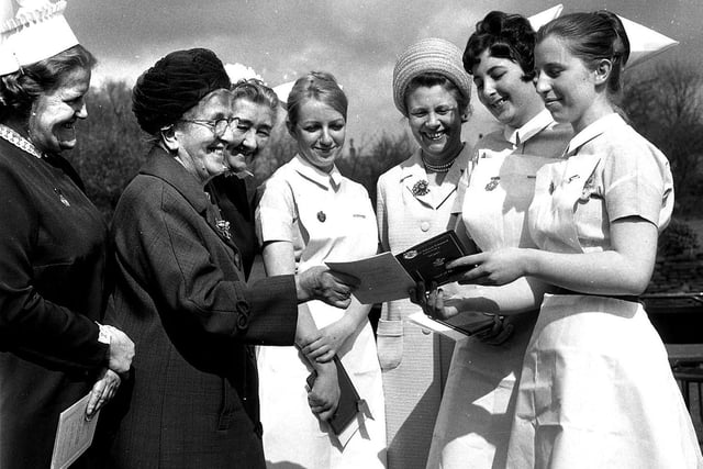 Nurses collect their awards at the Wigan Infirmary annual presentation ceremony in 1969