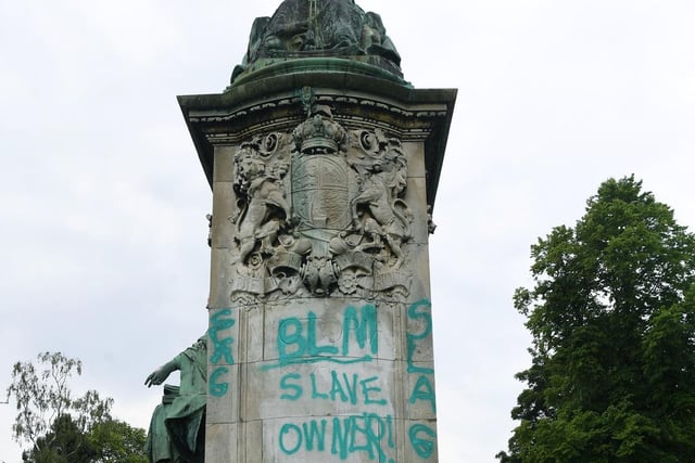 "Slave owner" was written on the side of the statue.