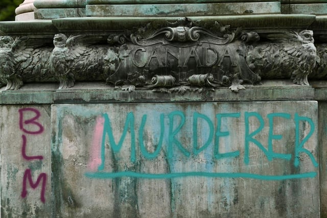 "Murderer" was written on the side of the statue.