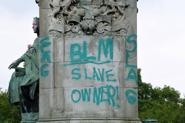 "Slave owner" was sprayed on the memorial.