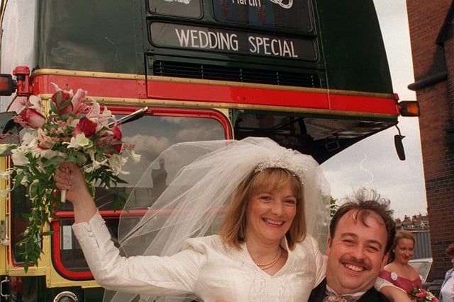 Leeds bus drivers Julie Bland and Martin O'Hara tied the knot. They were met by this 1965 AC Routemaster double decker outside St Aidans Church in which Julie had arrived earlier with her father.
