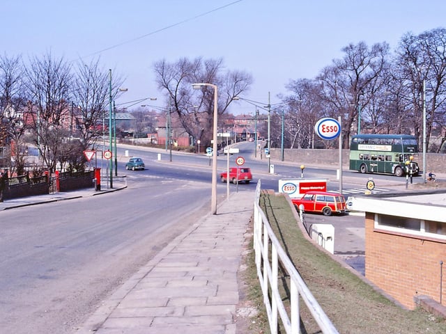 Armley Ridge Road.  "I used to cross that junction a lot. Caught trams there in the early fifties. Just behind me on the end of the row was Harry Hammond's dental surgery. Spent a lot of time in there."
