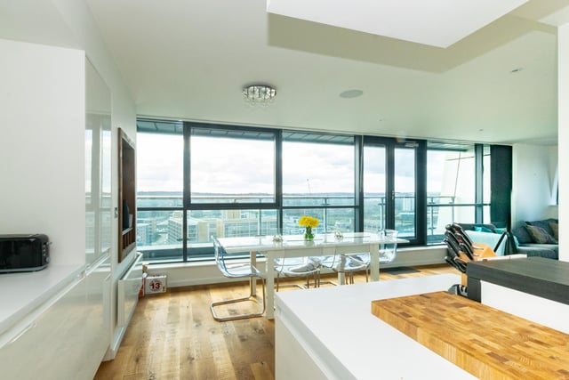 The open plan living area boasts views across the city.