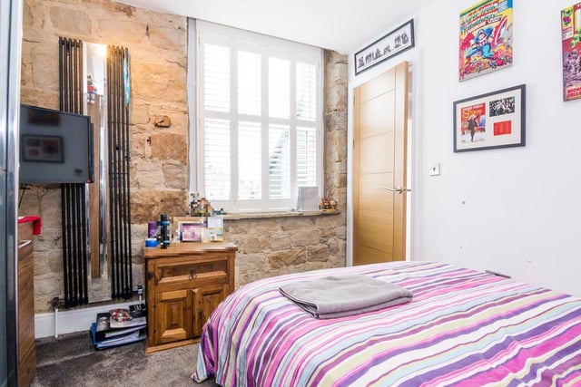 Three double bedrooms and a luxurious bathroom sit on the first floor.