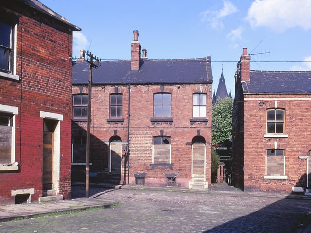 Demolition off Colton Road with St Bartholomew's Church between the buildings. This photo was taken in May 1969.