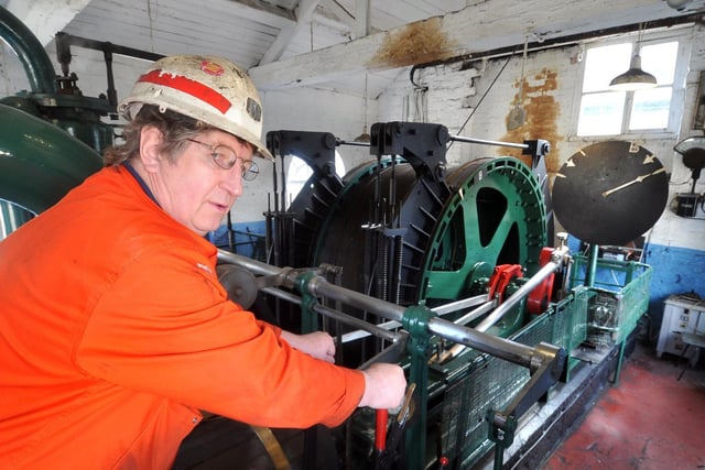 Lin Taylor operates the steam winder as part of the 'See How They Run Family Science Day at the National Coal Mining Museum for England.