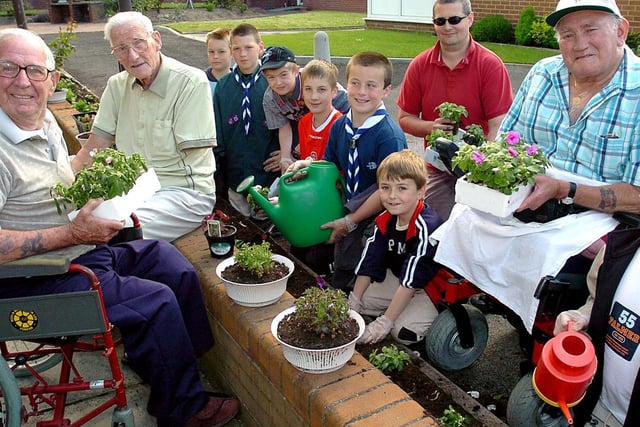 Members of the 23rd Blackpool Scout Group planting bulbs at the BLESMA Home, South Shore.