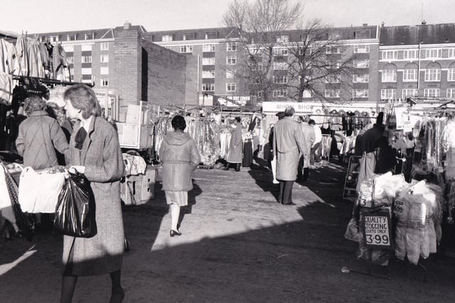 Another view of the open air market in November 1988. Have you noticed the price of quality jogging suits?