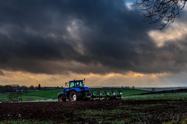 The average house price in Collingham, Rigton & Harewood is 832,500. Pictured: A farmer takes time to plough a field on the edge of Collingham.
