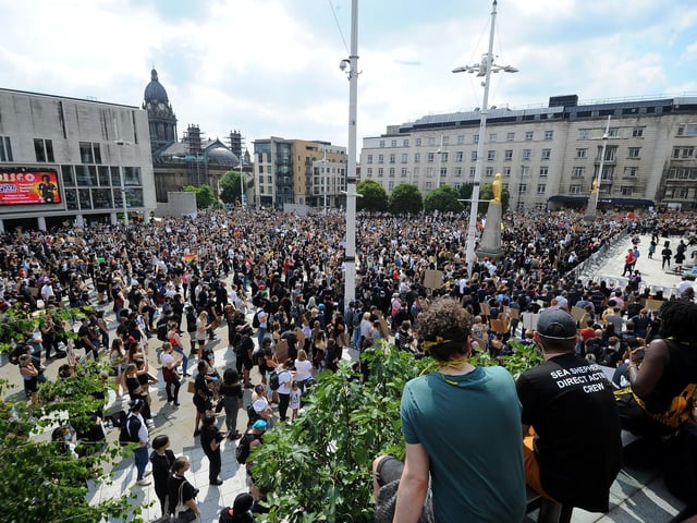Protesters climbed the steps for a better view over Millennium Square