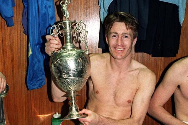 Striker Lee Chapman is all smiles for the camera. He scored 16 league goals for the Whites that season.