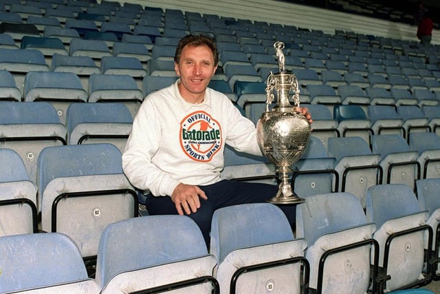Sgt Wilko pictured with the First Division trophy in the stand.