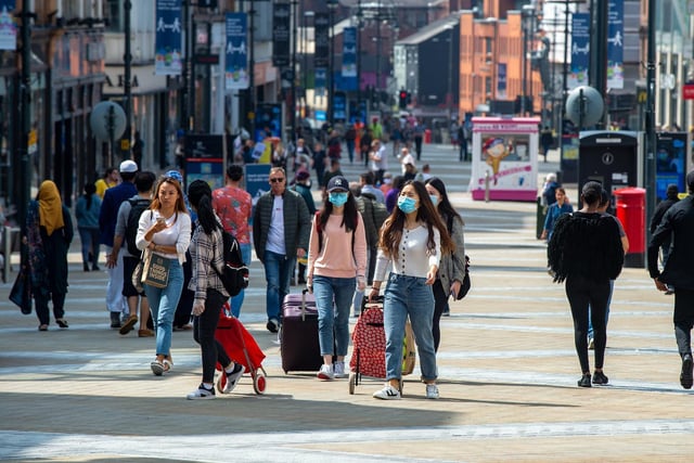 Hundreds flocked to stores in Leeds on Monday as shops reopened for the first time in three months - this photo shows Briggate. Photo: Bruce Rollinson