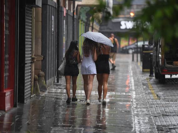 People were caught out by an afternoon of heavy showers in Preston