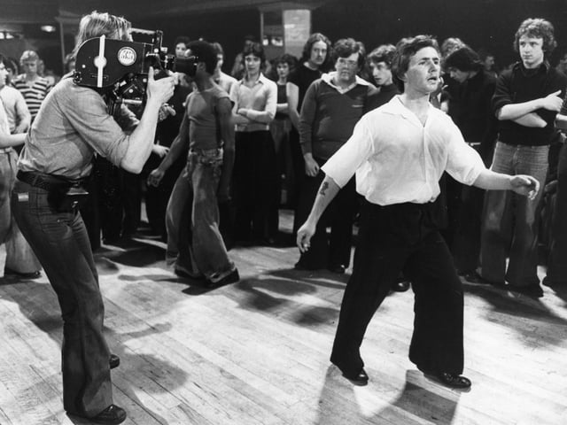 Dancers being filmed at the all-nighters at Wigan Casino, in the mid 1970's.