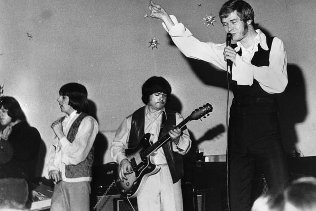 Long John Baldry on stage at Wigan Casino in the late 1960s. Blues singer Baldry was 6ft. 7ins. tall and had a number one hit with "Let The Heartaches Begin" in 1967.