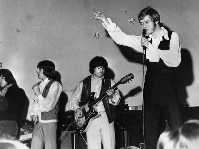 Long John Baldry on stage at Wigan Casino in the late 1960s. Blues singer Baldry was 6ft. 7ins. tall and had a number one hit with "Let The Heartaches Begin" in 1967.