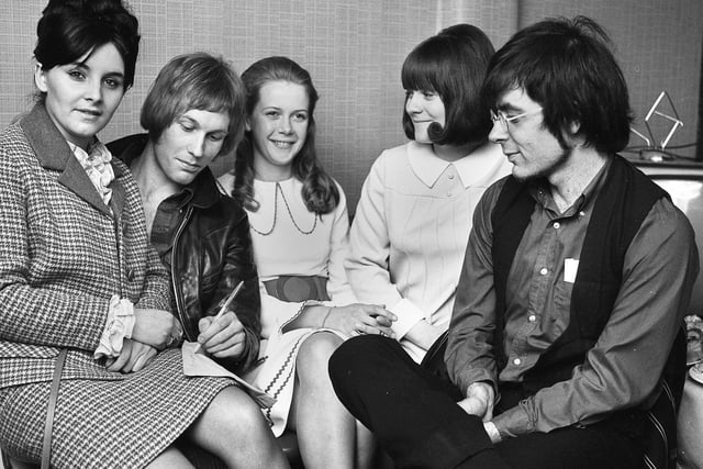 Singer Mike D'Abo and Mike Lubowitz from the group Manfred Mann, sign autographs for fans backstage at Wigan Casino where they appeared on Saturday 1st of June 1968