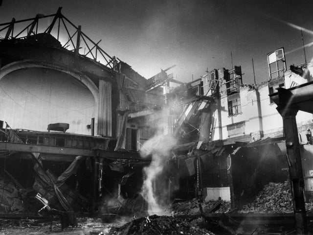 A piano still stands on the stage in the middle of the demolition of Wigan Casino in 1983 as a poignant reminder of its musical past