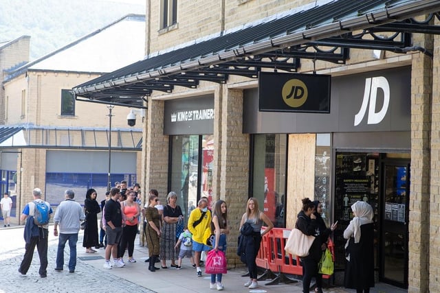 Queuing outside shops will be the new normal to abide by social distancing rules.