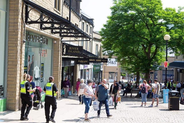 Shoppers told to stay 2m apart in the town centre.