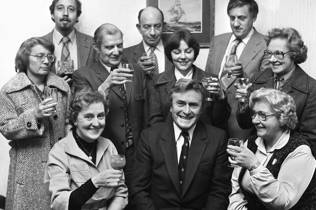 Cancer specialist at Wigan Infirmary, Dr. Philip Silver, front centre, is toasted by hospital officials on his retirement on Thursday 7th of February 1980