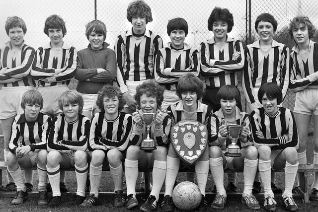 The Shevington High School Under 13's football team with trophies in April 1980.
They had won the Lancashire Evening Post Trophy as champions of the Wigan Metro Schools League, the schools 5-a-side final and shared the Lythgoe Knock-Out Cup with St. Thomas More RC High School.