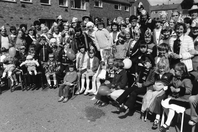 A happy line up of neighbours from Manor Close in Yeadon, at their Jubilee party in June 1977.