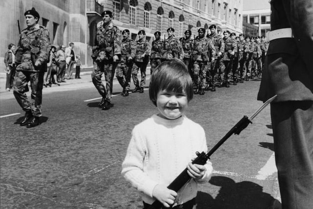 Four-year-old Robert Lee took along his own toy rifle and bayonet when he went to watch his dad, Private Robert Lee of C (Leeds Rifles) Company 2nd Battalion Yorkshire Volunteers in the Silver Jubilee Parade.