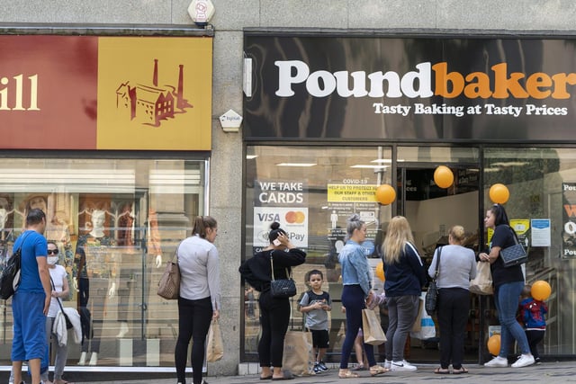 Hungry for normality, these shoppers wait outside the newly reopened Pound Bakery on Kirkgate.