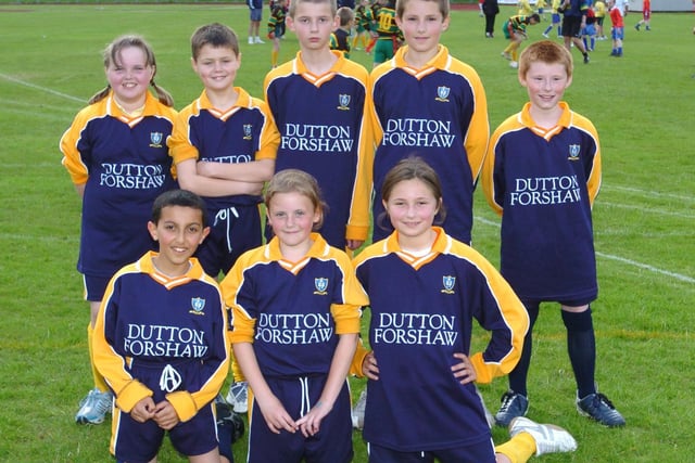 Tag Rugby action from the 2005 Youth Games at Stanley Park in Blackpool. At back, left to right, are Baines team members Emily Greenall, Daniel Teare, Andrew Clark, Ben Woodcock and Connor Heed. At front, left to right, are Ghazwan Al-Idari, Georgina Brumwell, Kieran Evans and Abigail Bates