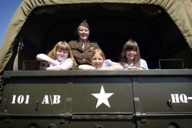The Odeon Cinema, Blackpool, held a special 1940s event for local school children. Pictured: Sandra Lindsay shows Revoe pupils Charlotte Conchie, Siobhan Drinkwater and Shannon Savery an American army truck