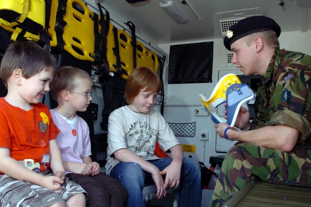 Private David Bolton from Chorley gives a demonstration to children at the Preston Military Show at Fulwood Barracks. David is with C (64) Medical Squadron, Chorley