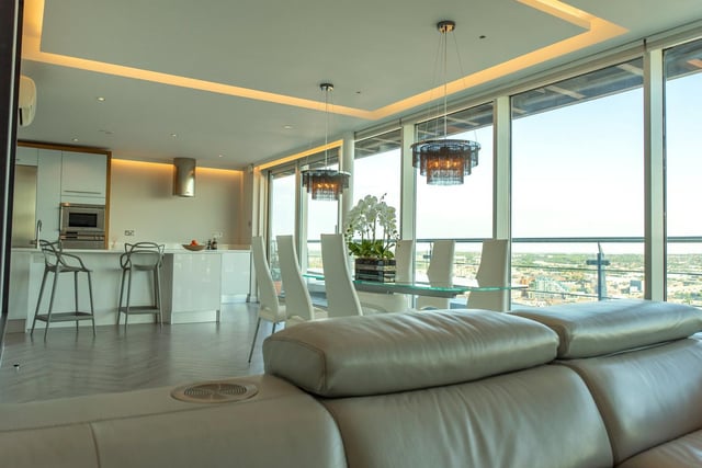 The floor-to-ceiling windows provide breathtaking views.