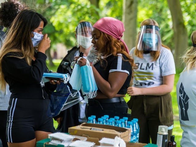 More than 100 volunteers were overseeing the demonstration, handing out masks and hand sanitiser