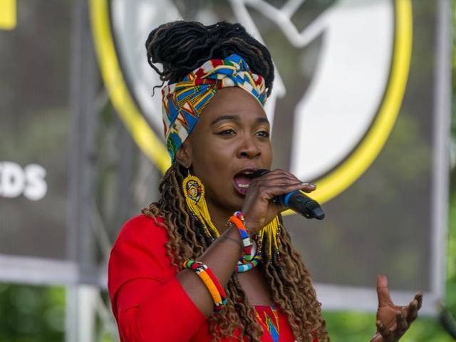 Marvina Newton, one of the Black Lives Matter Leeds founders, addressing the crowd. She was followed by a line-up of speakers and poets